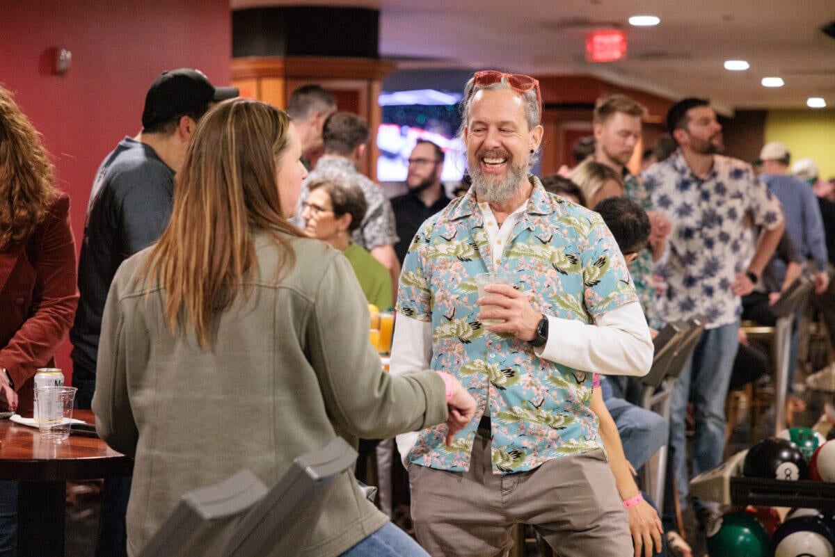 Two tms employees speaking