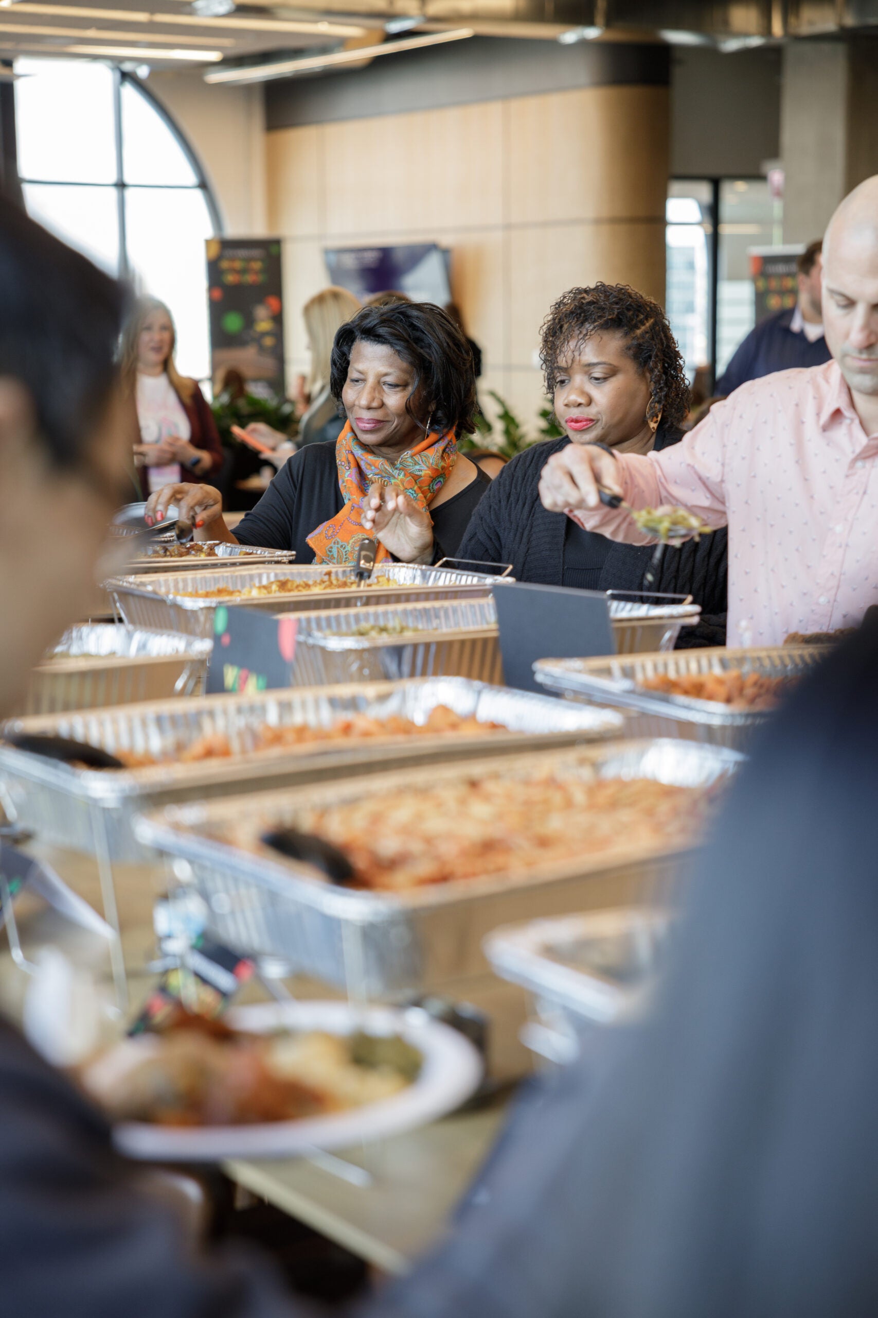 tms employee enjoying the buffet style lunch