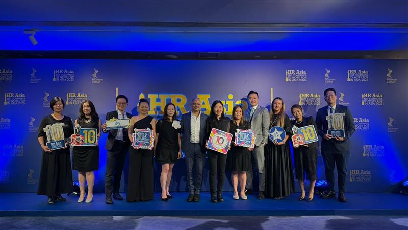 A group of tms colleagues at the HR asia awards celebrating