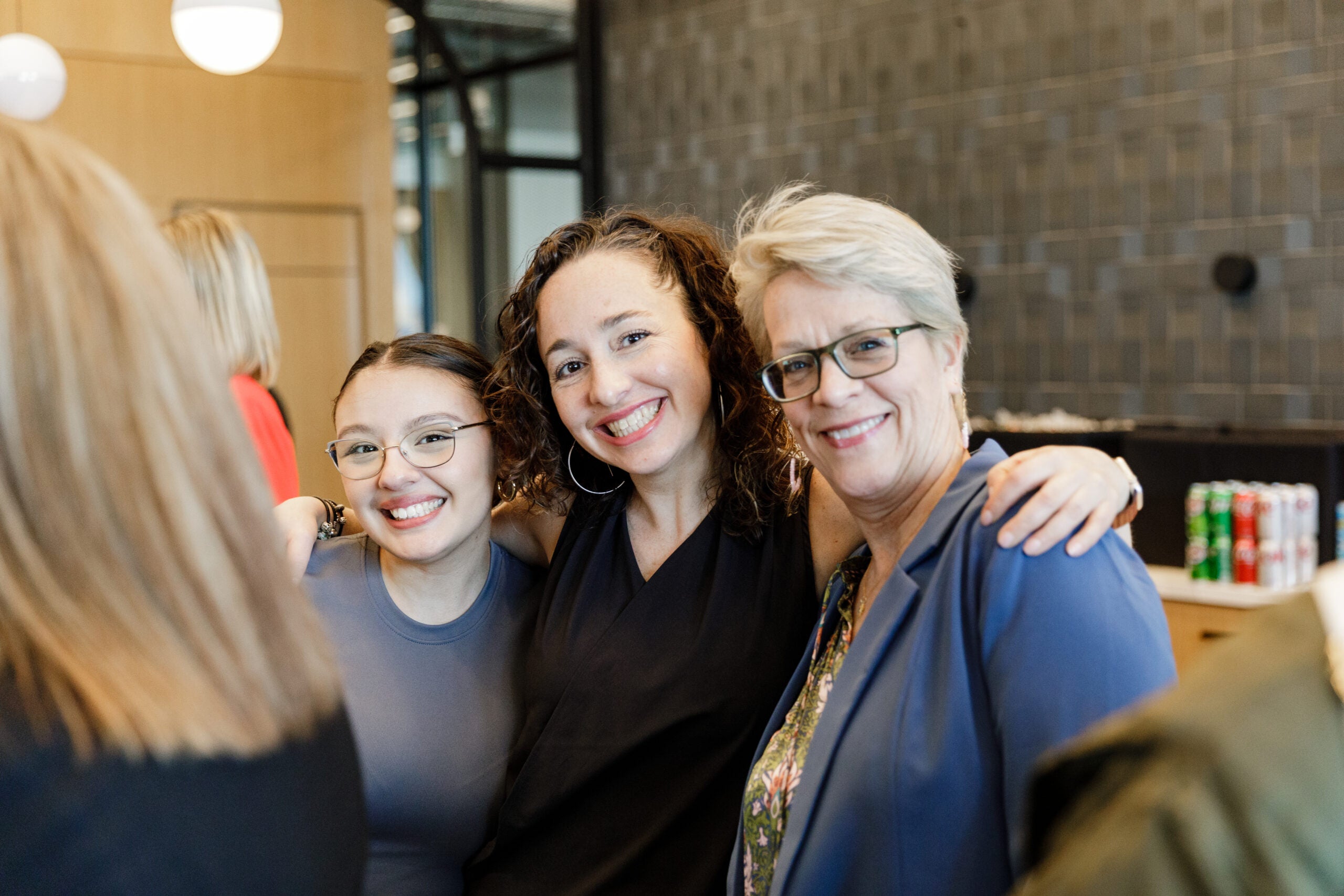 Women tms colleagues posing for a photo