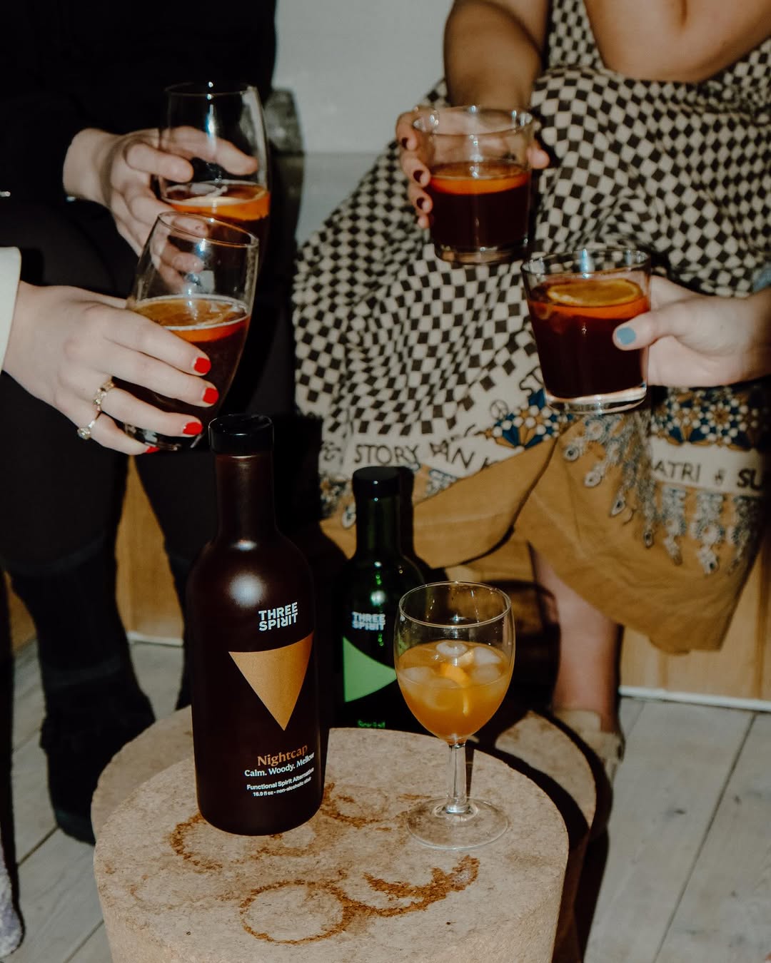 A group of people toasting their glasses