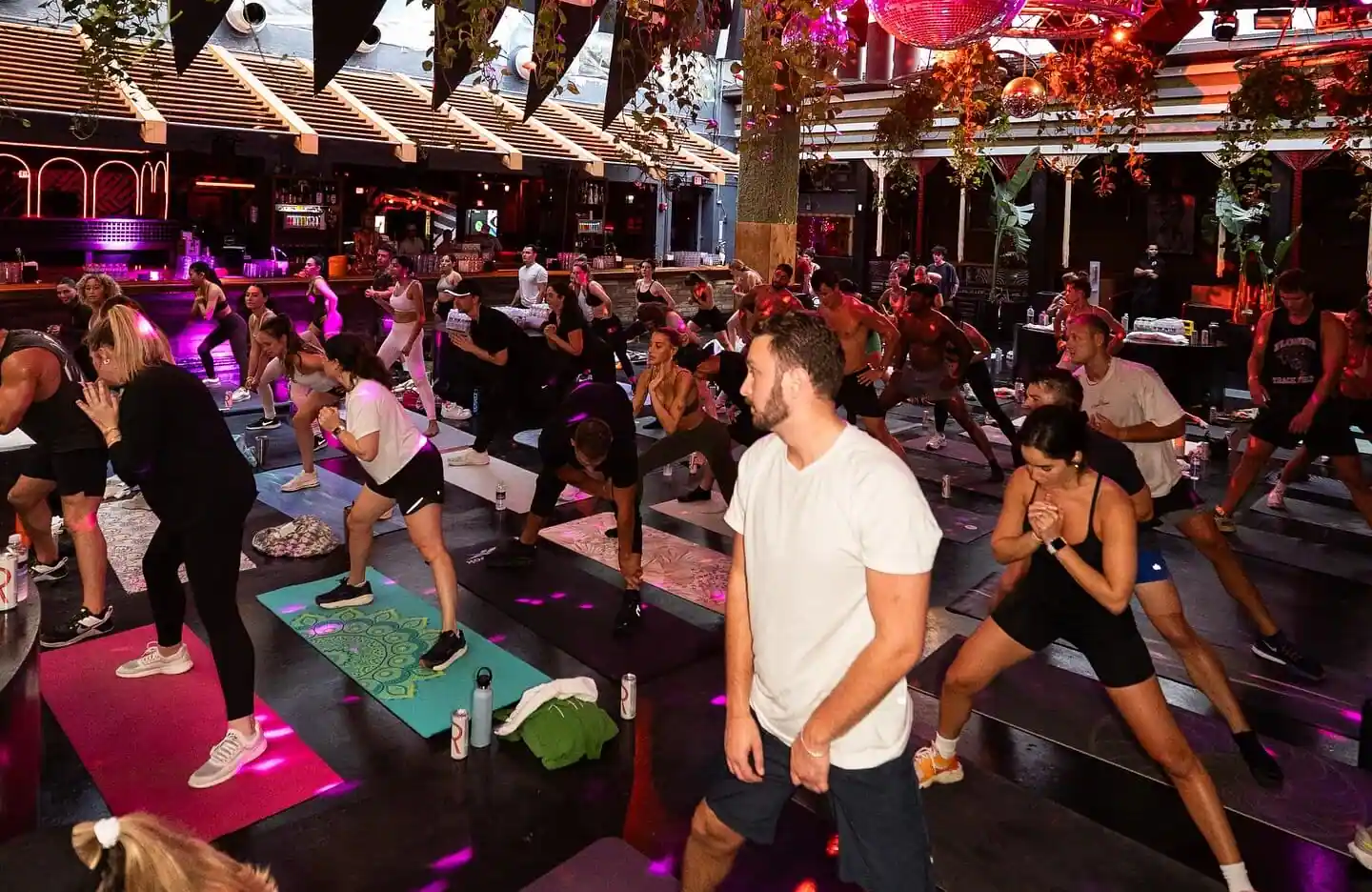 People attending a yoga event at Space Miami