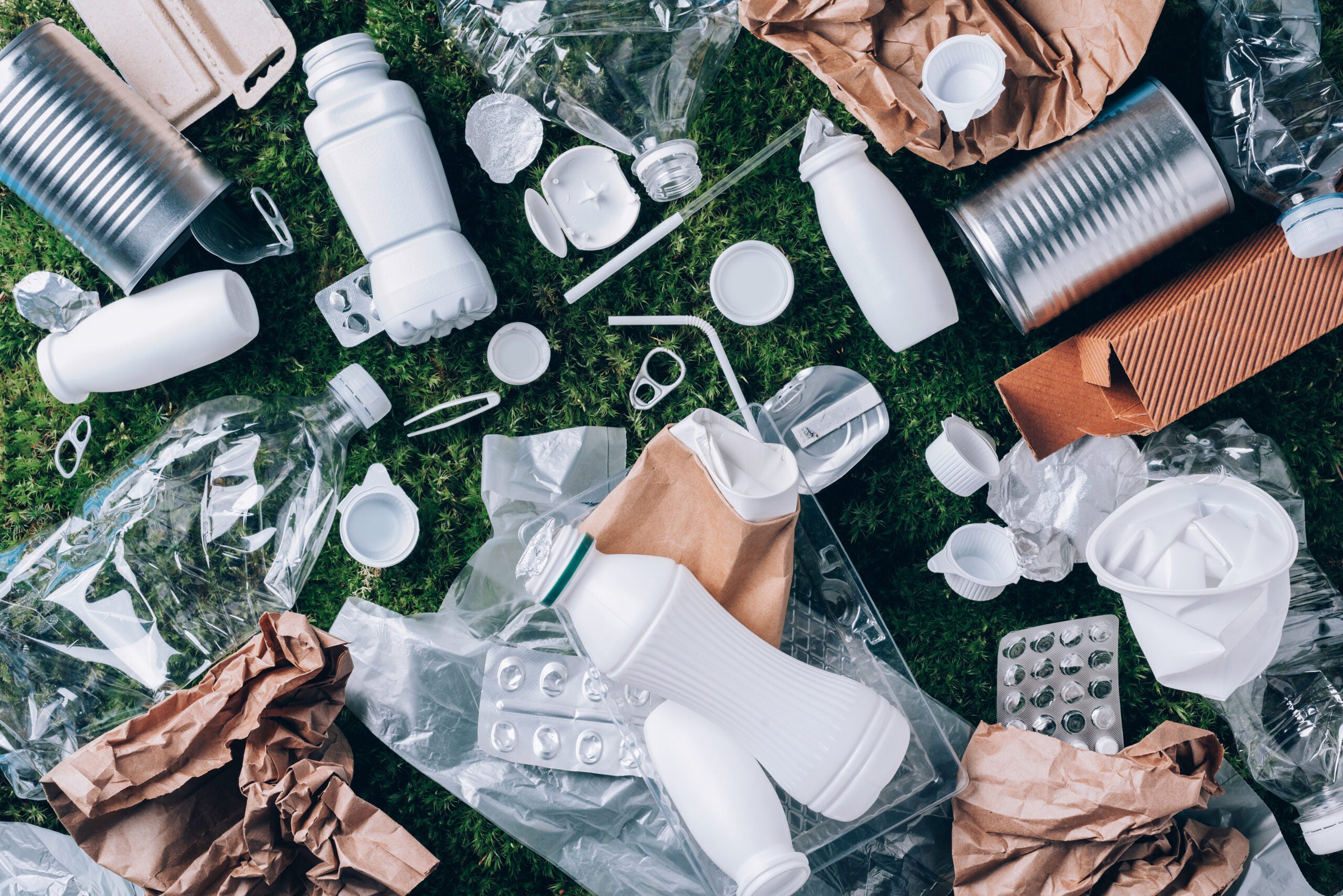 Image of recyclables scattered on the ground