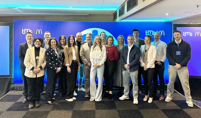 A group of colleagues posing for a photo at the Amsterdam Supplier Forum