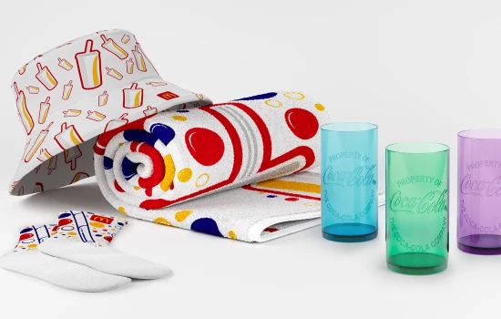 Image of McDonald's prizes like Coca-Cola glasses, a bucket hat, and towel