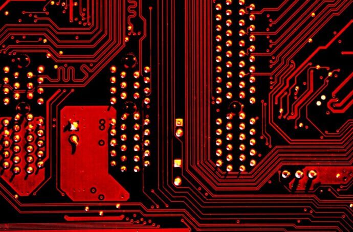 Image numérique zoomée d'un composant de machine rouge