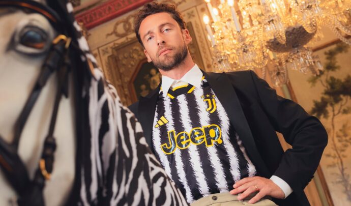 A man in Juventus uniform posing for the camera