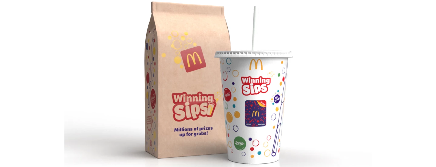 Image of a McDonald's paper Winning Sips bag and soda cup