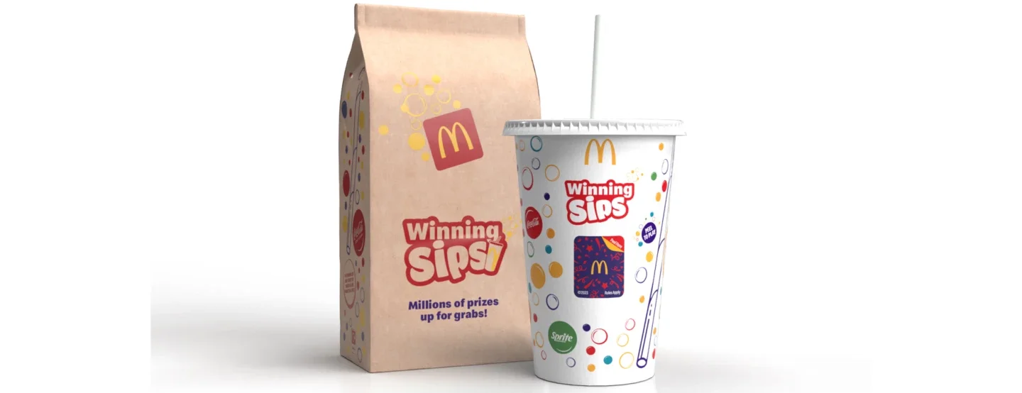 Image of a McDonald's paper Winning Sips bag and soda cup