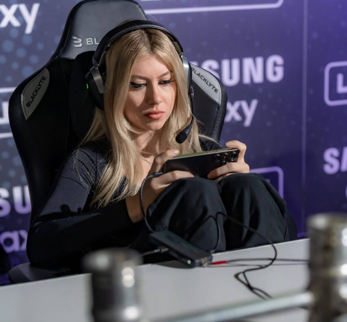 A woman gaming at the LVL Up Cup