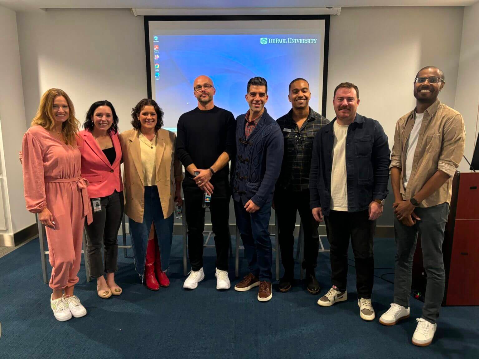 group of professionals standing in a corporate environment