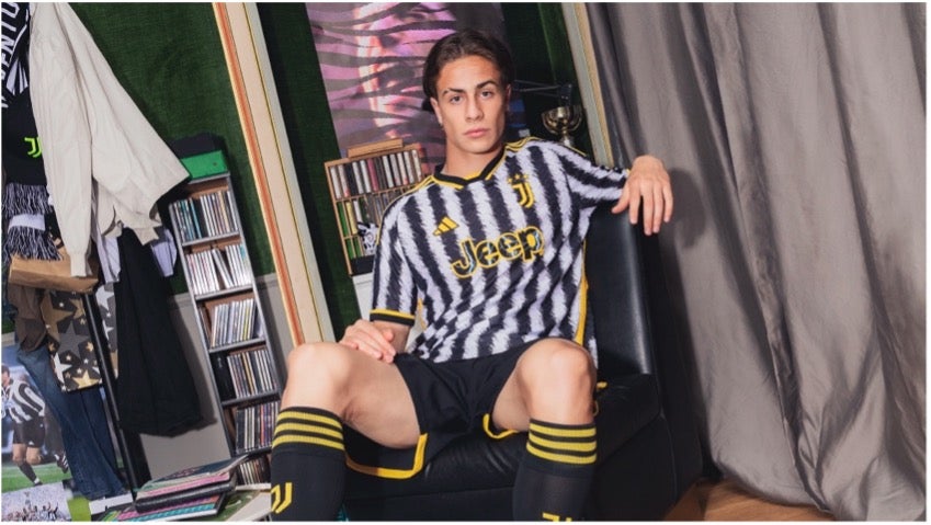 A man in the Juventus black and white striped football outfit