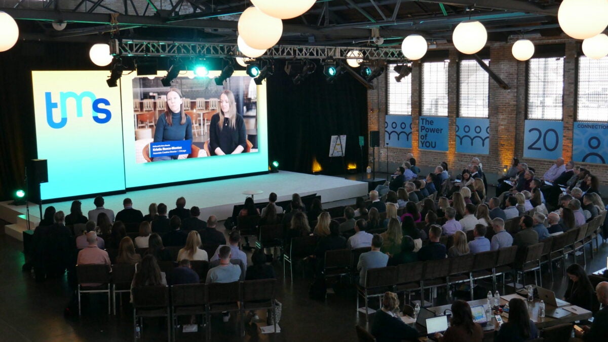 tms Connections event space with a crowd