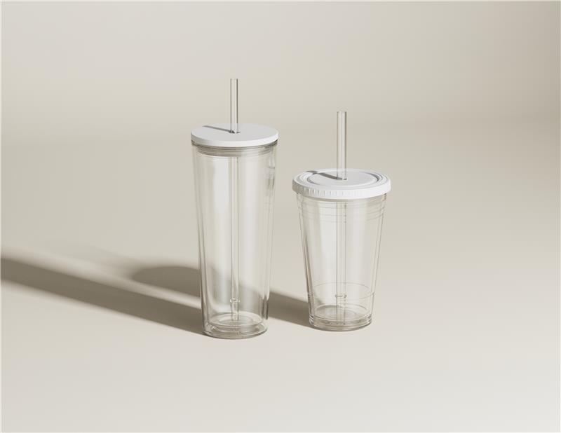 Two clear tumblers on a white background