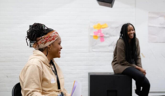 a couple of people smiling