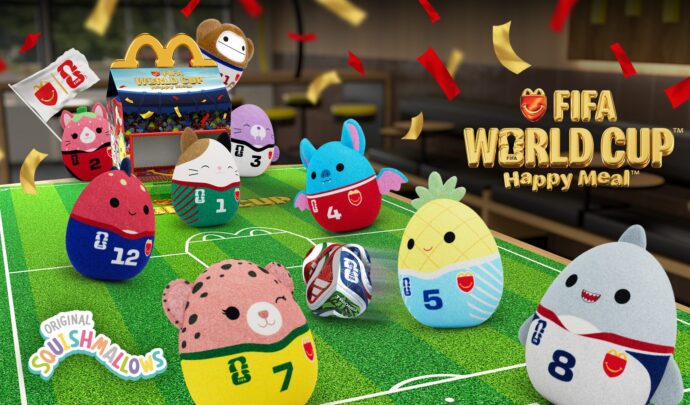 Squishmallows Happy Meal retail poster with an assortment of Squishmallows toys on a soccer field