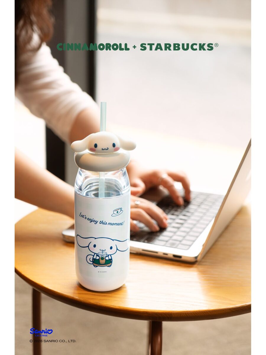 Starbucks x Sanrio tumbler in front of a computer