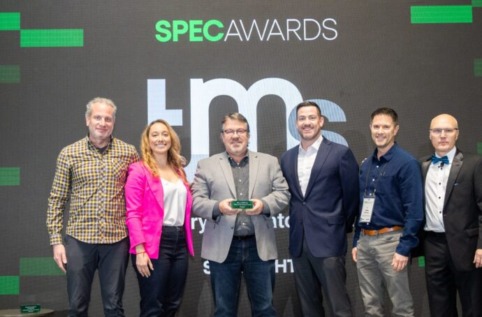 A group of people posing at the Specright Awards