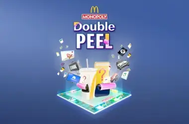 Logo Double Peel Monopoly avec plateau de jeu