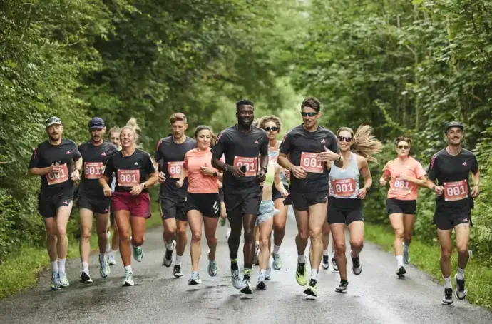 group of people running on a road
