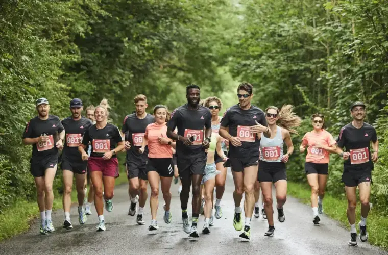 group of people running on a road