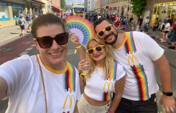 A selfie of three tms pride-goers