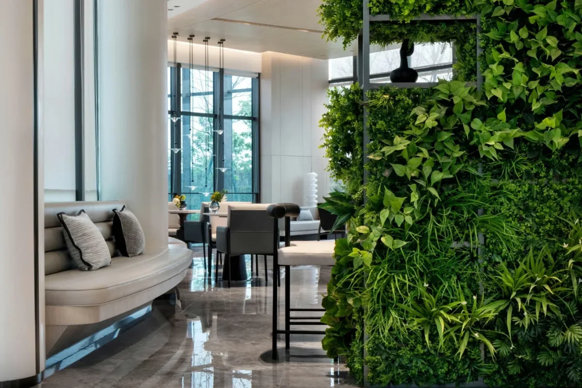 hotel reception space with lots of plants