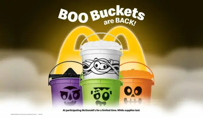 4 Halloween Happy Meal Boo Buckets against McDonald's Logo