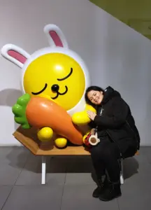 Renne next to big rabbit statue