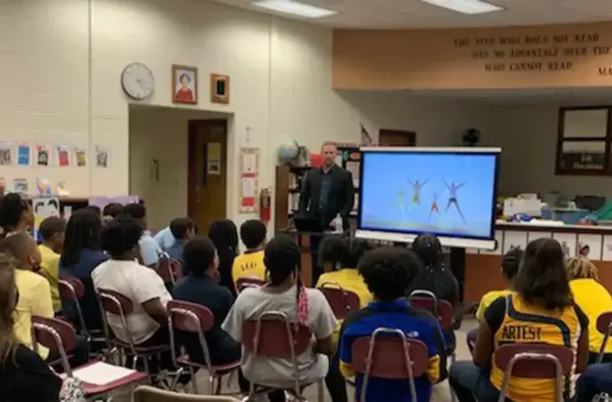 children and teacher in a classroom