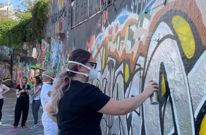 tms employees participating in legal Graffiti art on the streets of London