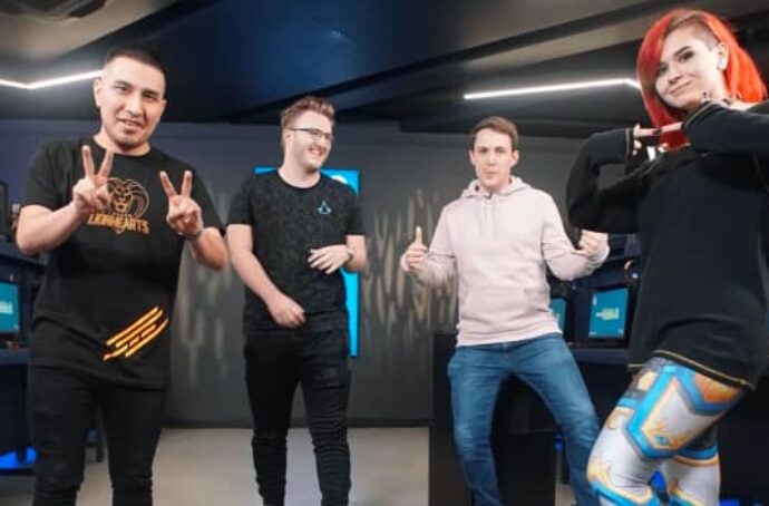 4 gamers striking a pose