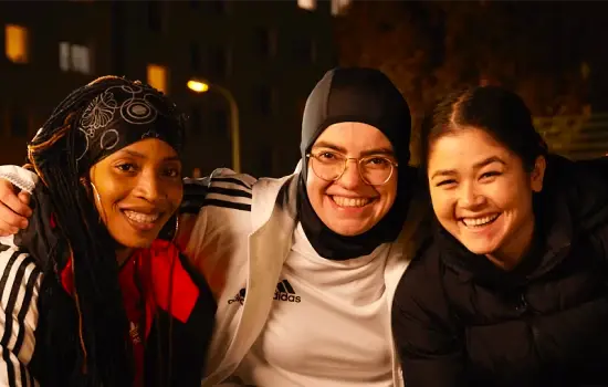 3 people smiling