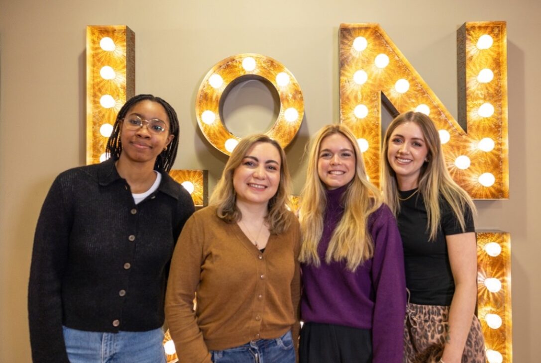 A photo of tms London's new digital team with four members posing for a photo