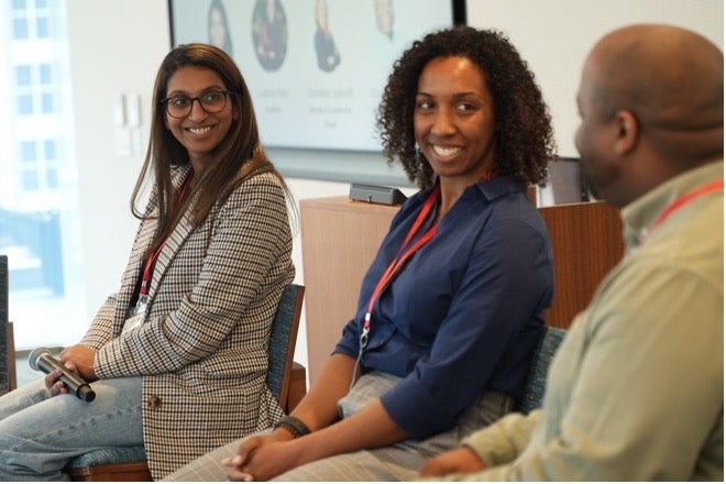 Malavika partaking in a panel discussion