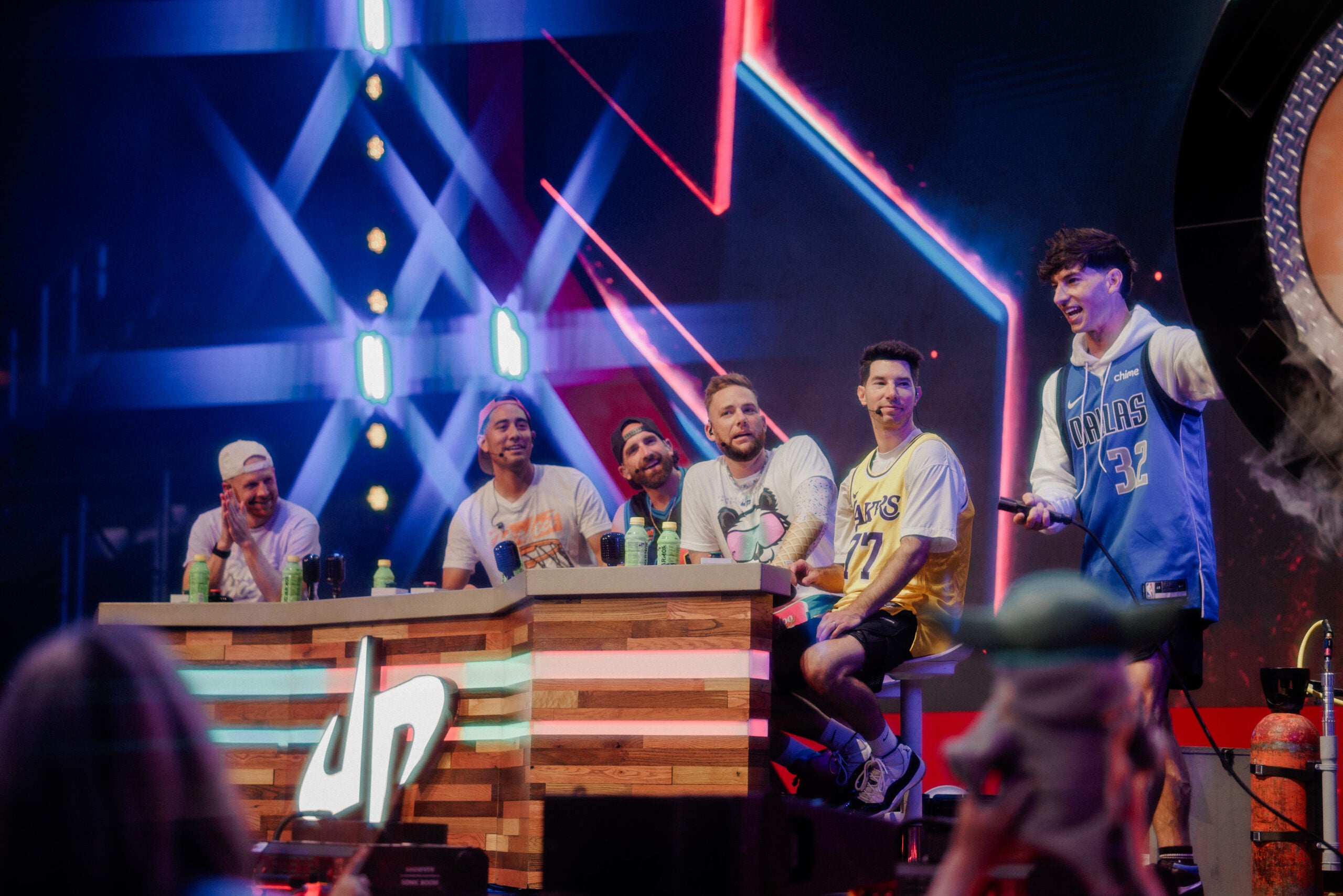 Members of Dude Perfect sitting at a table for a segment