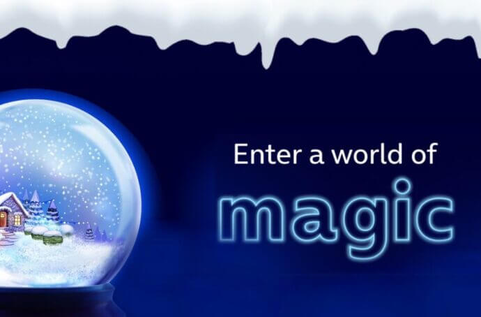 A snowglobe with the text "enter a world of magic" on the right