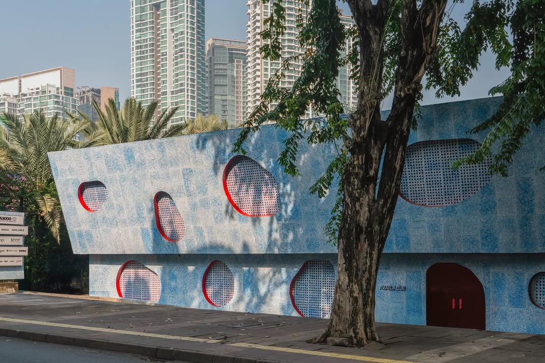 colourful building with palm trees